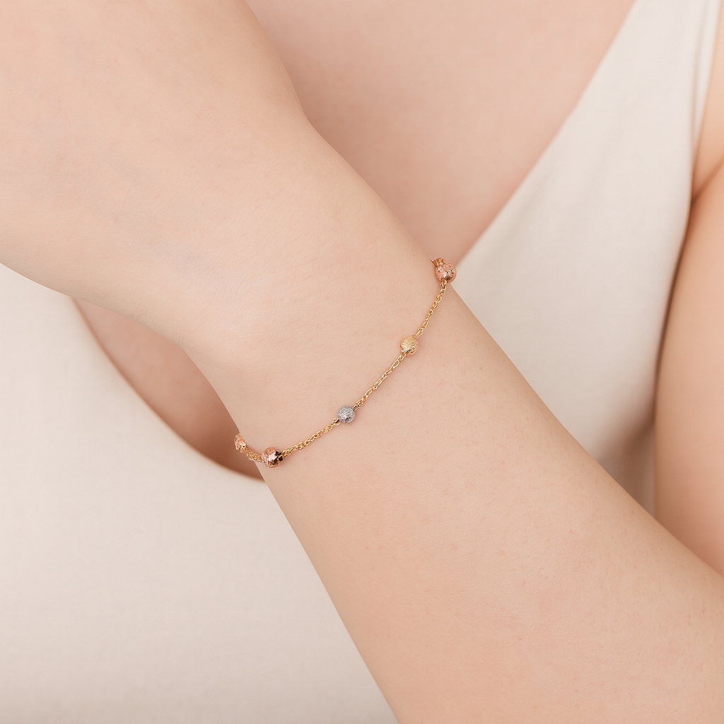 PULSERA BOLAS DIAMANTADAS TRES OROS 