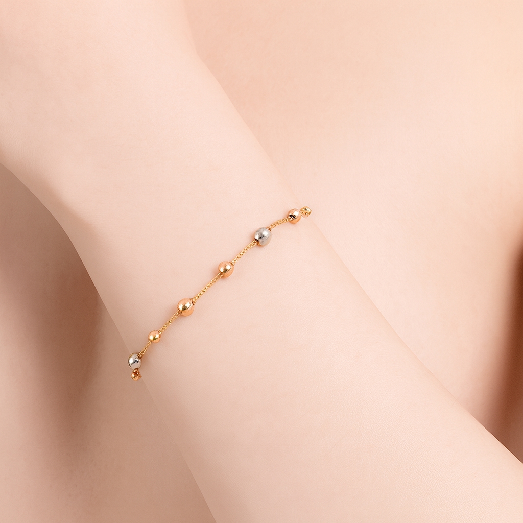 PULSERA BOLAS TRES OROS 