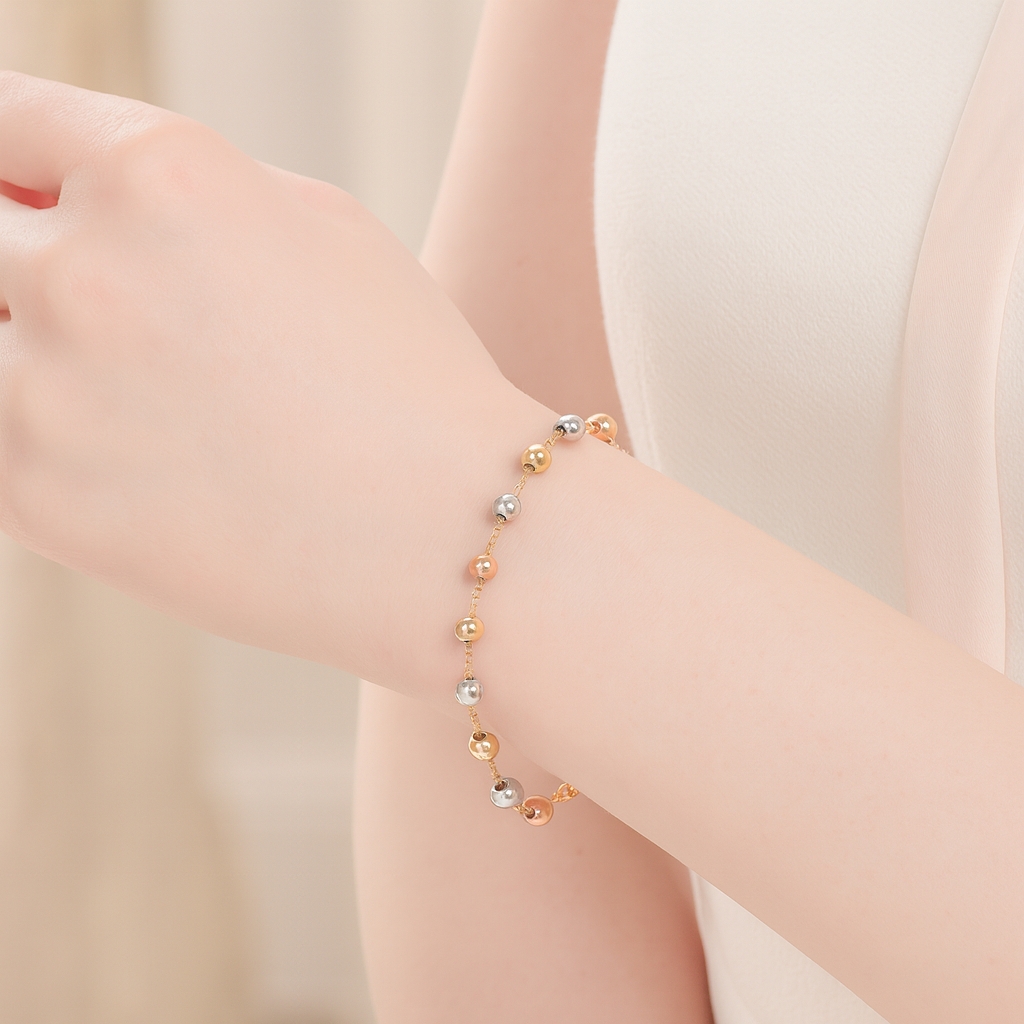 PULSERA BOLAS TRES OROS 